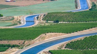 The State Water Project (SWP) California Aqueduct San Luis Canal and the federal Central Valley Project (CVP) Delta-Mendota Canal travel through Merced County, California. Photo taken May 12, 2023.
