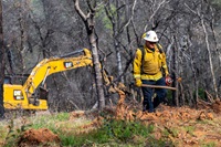 Gus Boston, battalion chief with CalFire, onsite for fuel load management work, including controlled burns, and working in conjunction with California Department of Water Resources at Loafer Creek State Recreation Area in Oroville, California. The work is part of the fuel load management program which reduces fire risk, protects public safety, and enhances forest and watershed health. Photo taken March 2, 2022
