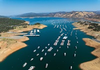 A drone view of houseboats at Bidwell Canyon Marina on Lake Oroville in Butte County, California. On this date, the water storage was 2,243,714 acre-feet (AF), 66 percent of the total capacity. Photo taken September 5, 2024.
